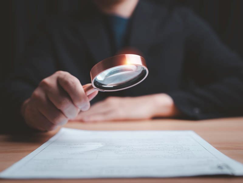 Contract and Magnifying Glass