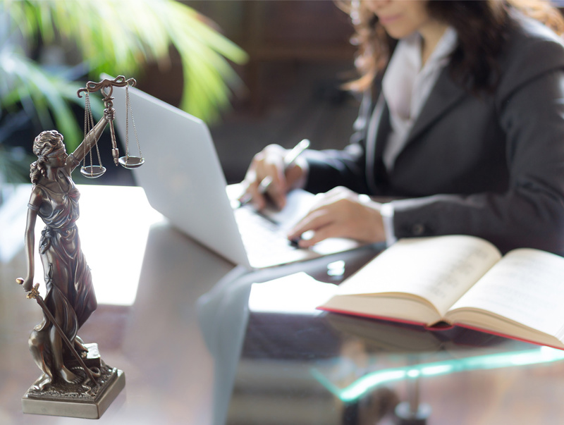 lady-justice-desk-woman-working.jpg